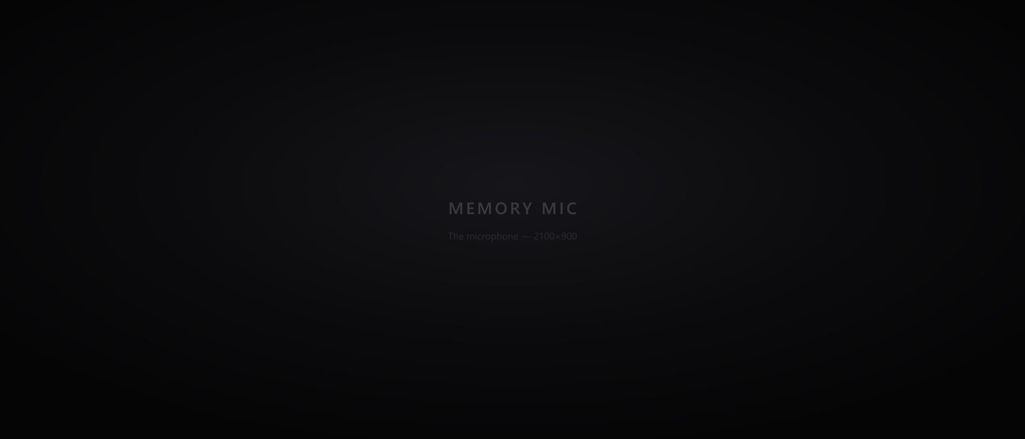 A guest holding the Memory Mic microphone, mid-message.